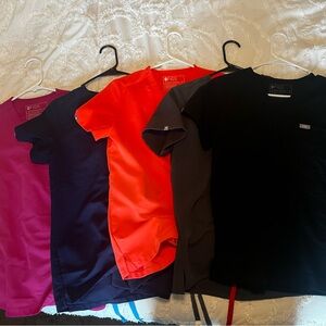 Figs Scrub Tops in Pink, Navy, Red, and Black